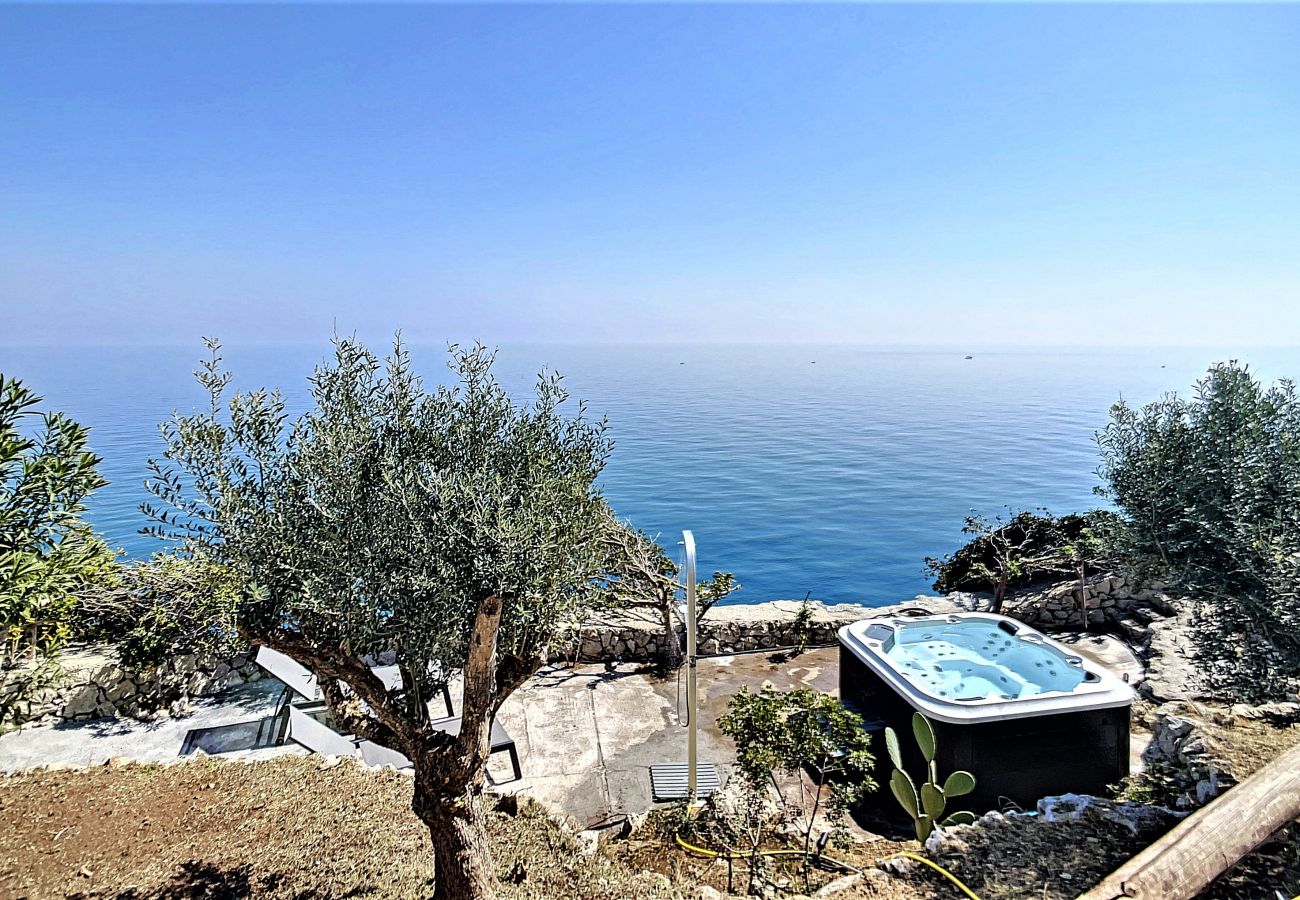 Villa à Castro - Superbe villa avec jacuzzi et accès privé à la mer