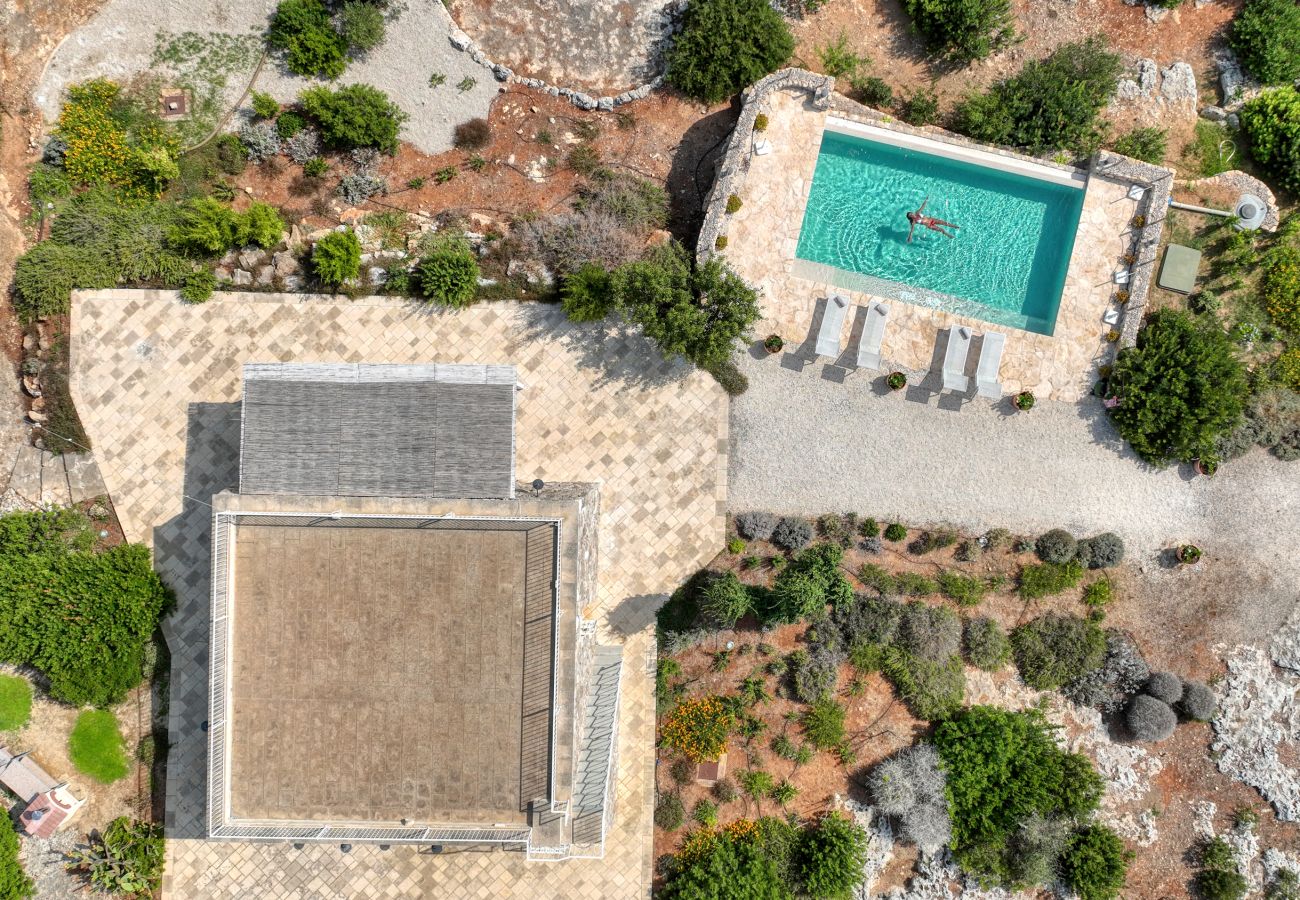 Villa à Pescoluse - Villa moderne en pierre avec piscine et vue mer