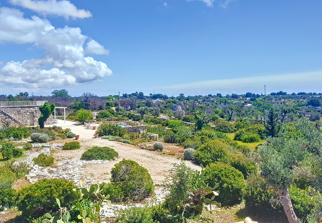 Villa à Pescoluse - Villa moderne en pierre avec piscine et vue mer