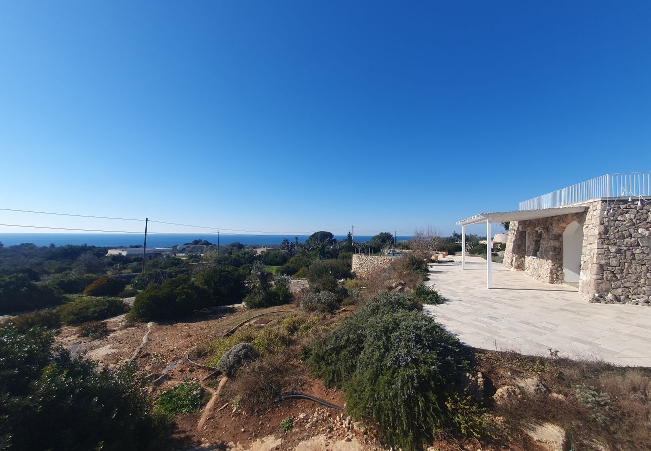 Villa à Pescoluse - Maisons en pierre avec piscine infinity e vue mer