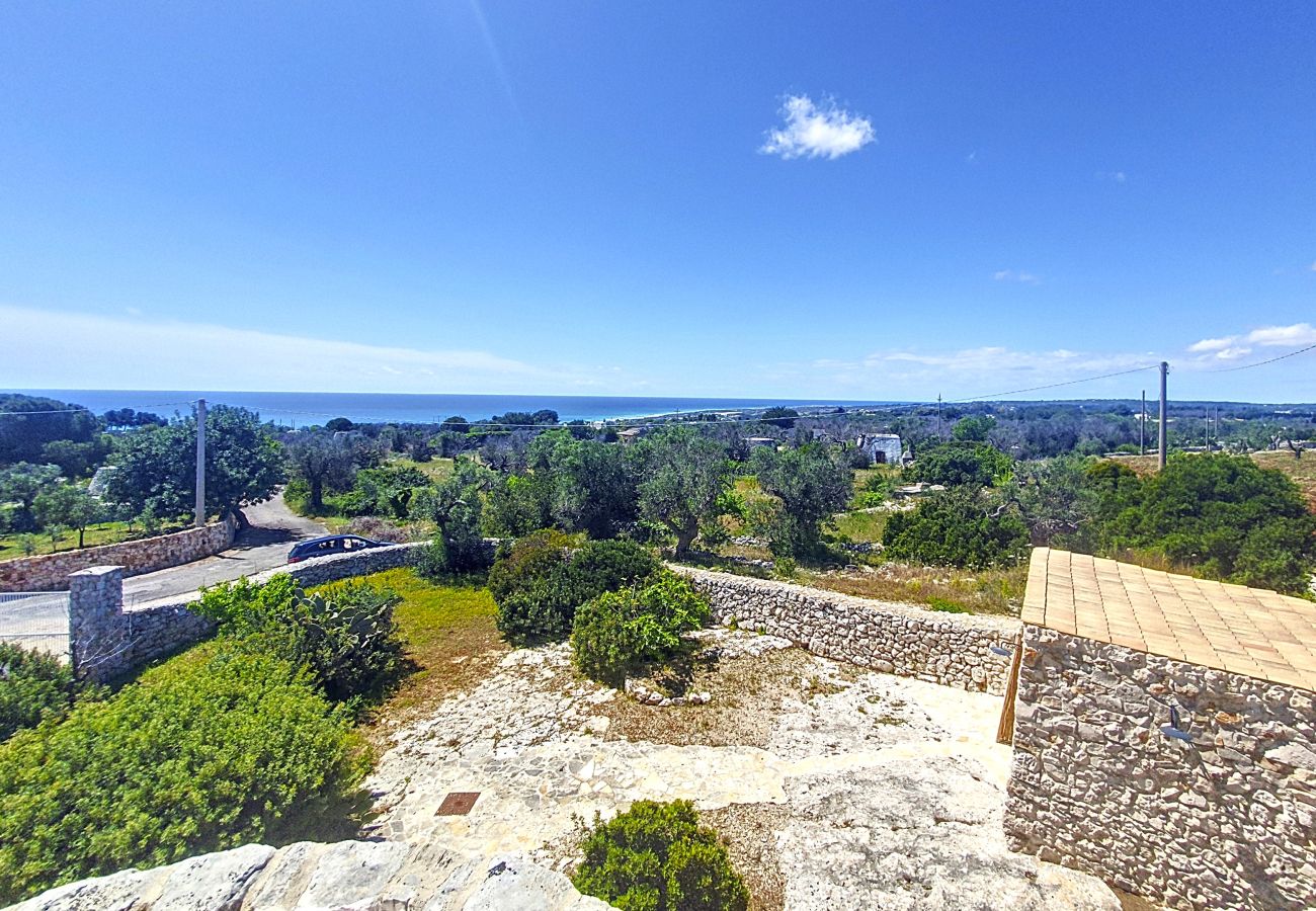 Villa à Pescoluse - Maisons en pierre avec piscine infinity e vue mer