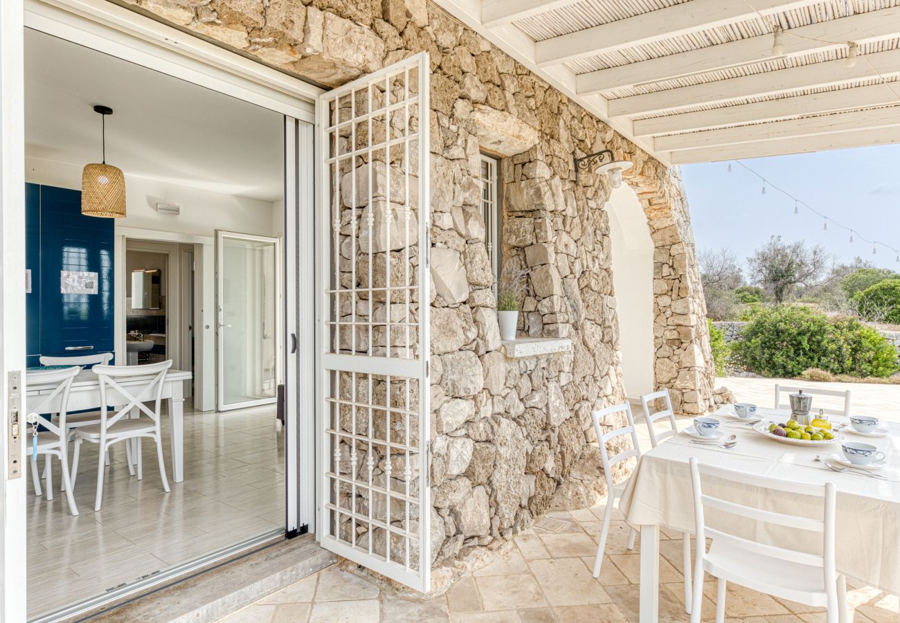 Villa à Pescoluse - Maisons en pierre avec piscine infinity e vue mer