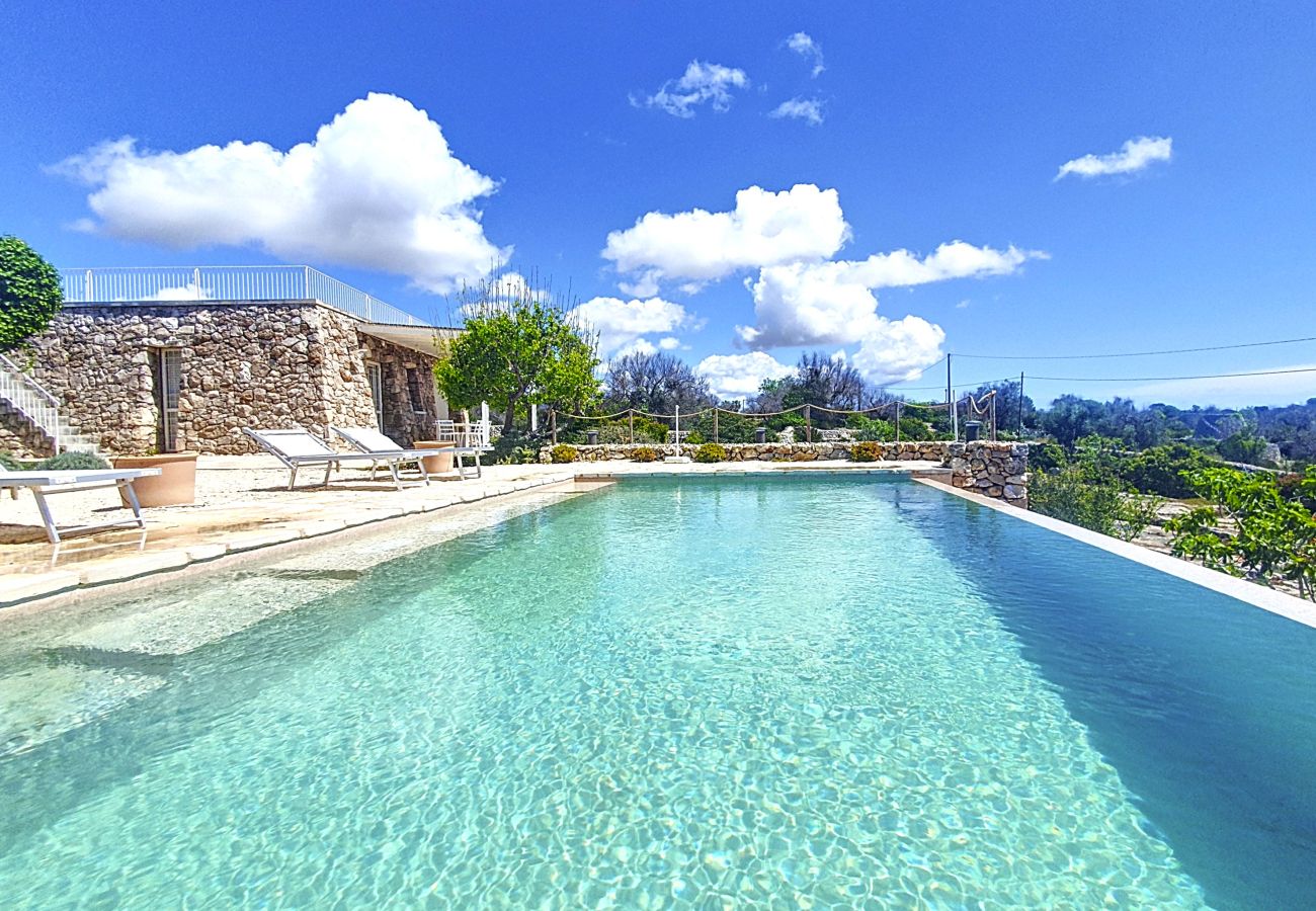 Villa à Pescoluse - Maisons en pierre avec piscine infinity e vue mer