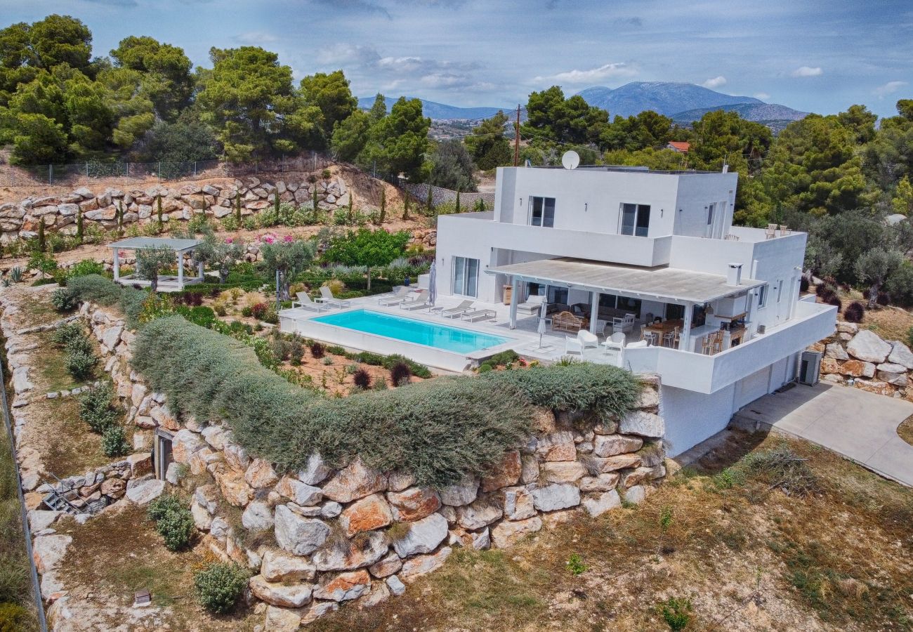 Villa a Porto Heli - Villa contemporanea con piscina, vista mare stupenda