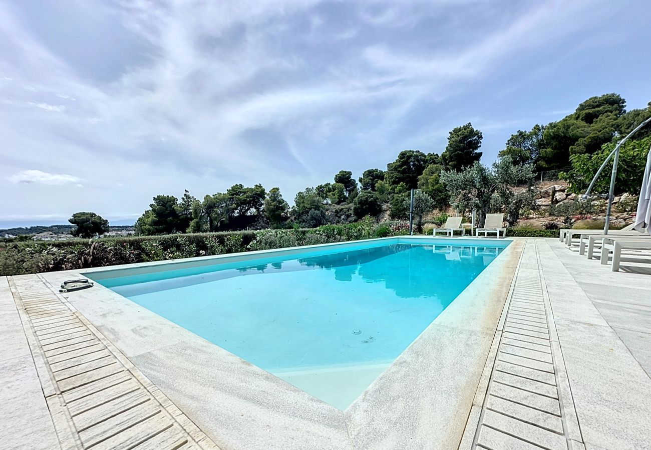 Villa a Porto Heli - Villa contemporanea con piscina, vista mare stupenda